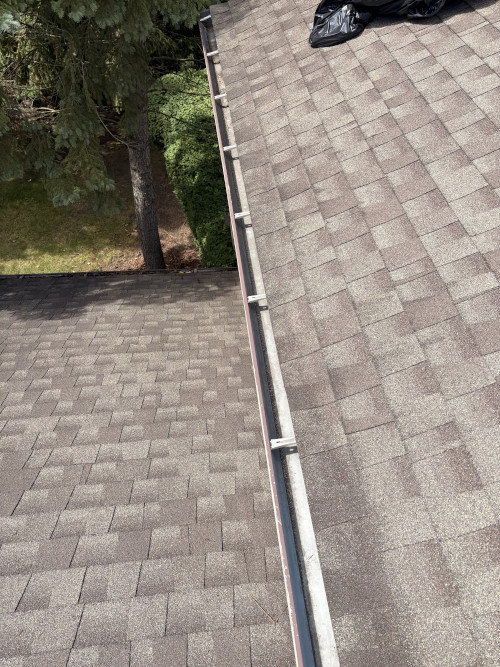 Gutter debris removal on a Northeast Ohio home